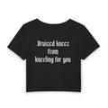 Women's Baby Tee — "Bruised knees from kneeling for you" Gothic Text Crop Top